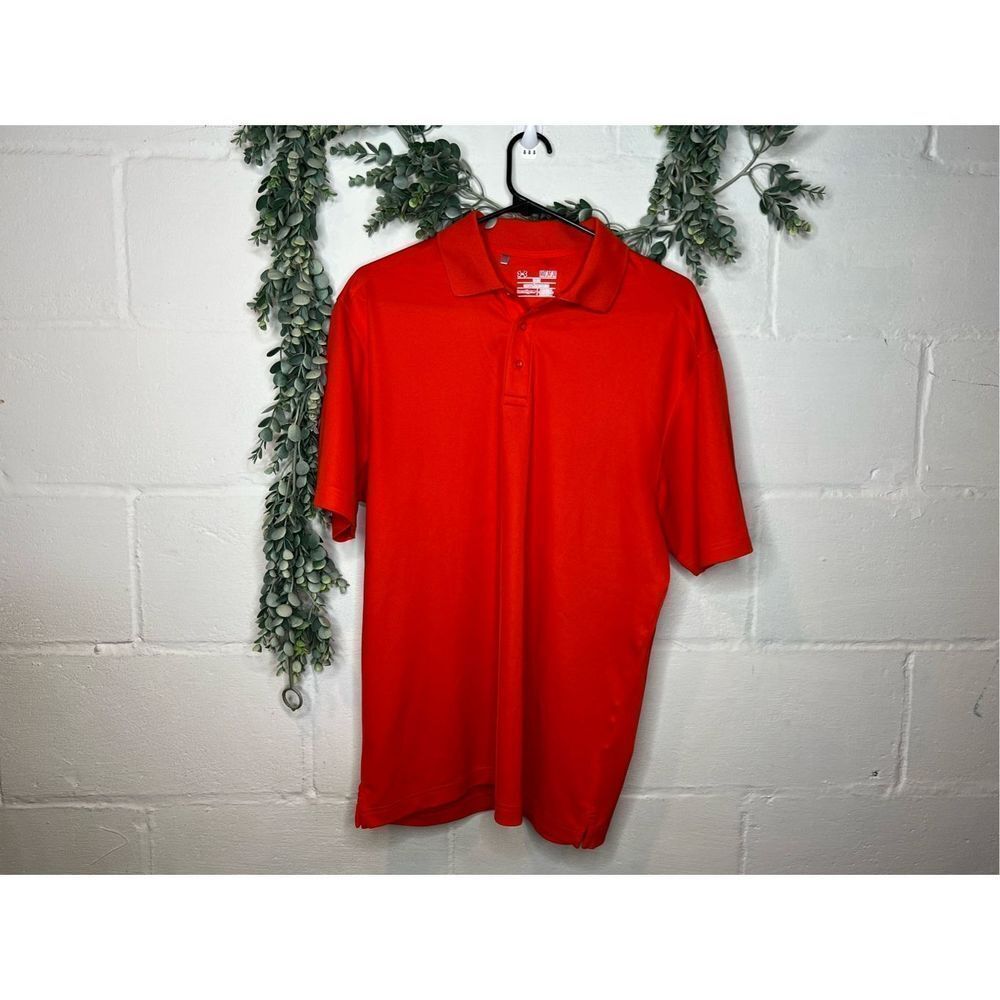 Men’s under armour heat gear golf polo orange color.